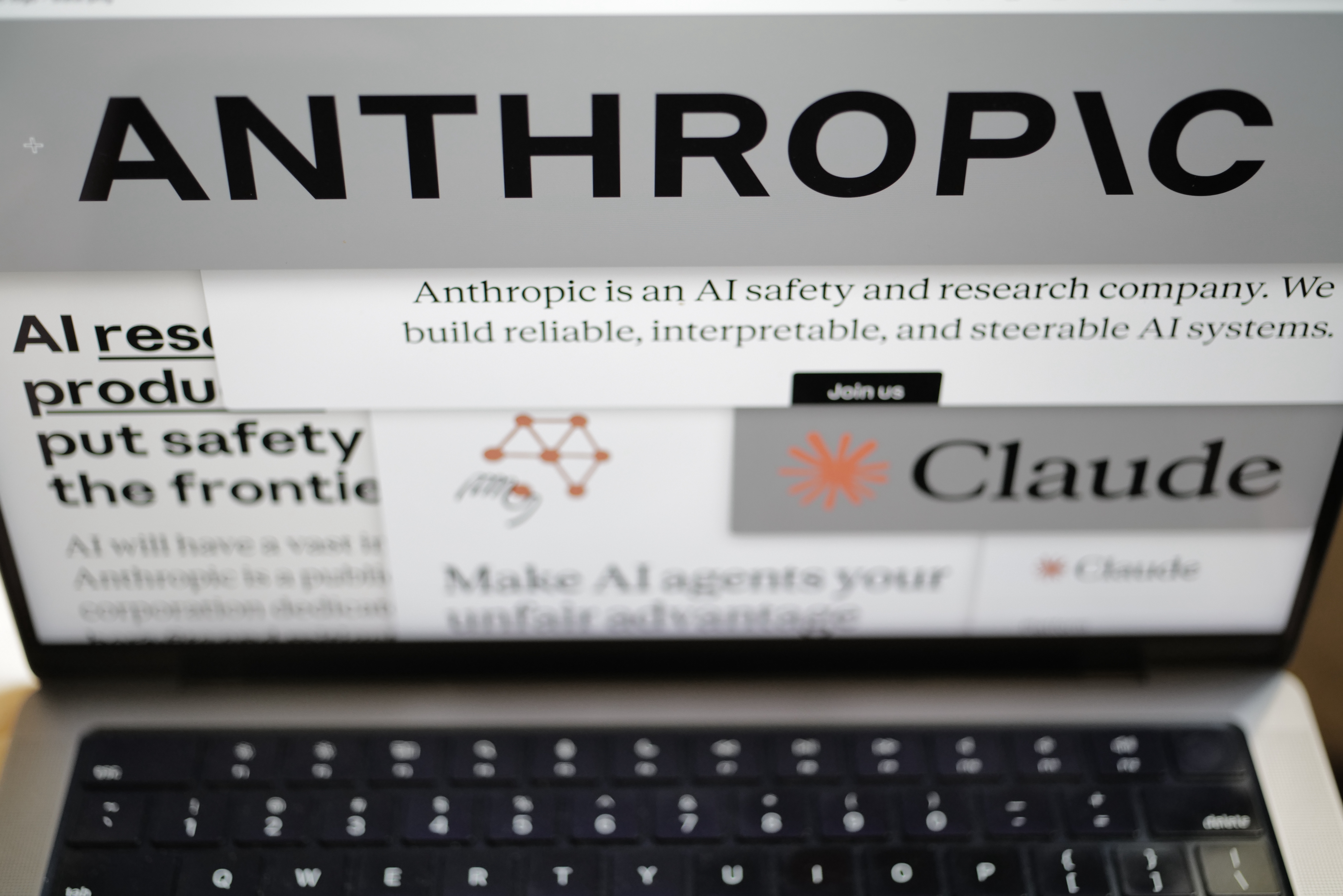 Pages from the Anthropic website and the company